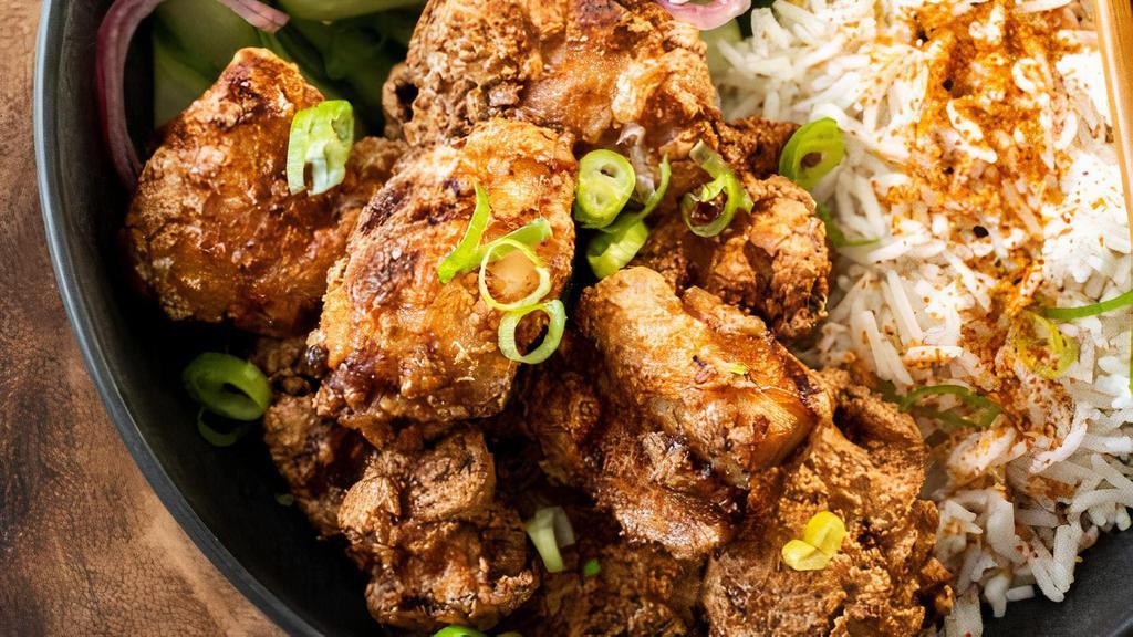 Roku Fried Rice Karaage Bowl   (Marinated Fried Chicken) · Our Popular Marinated and Breaded Chicken Karaage served with our popular Roku Fried rice topped with green onions, Nori, and Crispy fried onion