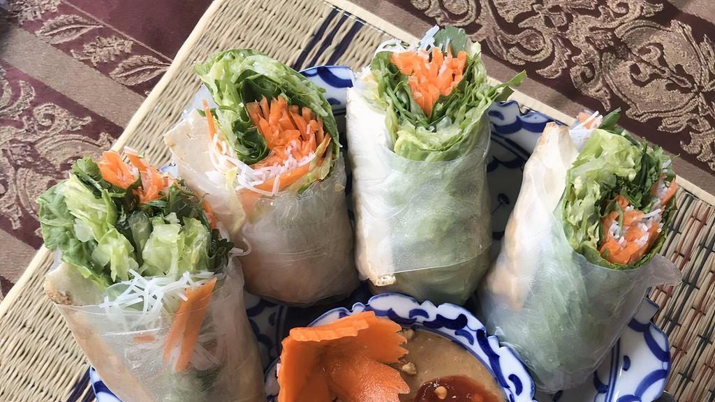 Salad Rolls (2Pc)  · Fresh lettuce, mint leaves, carrots, cilantro and vermicelli noodles wrapped in rice paper served with peanut sauce. Gf* V.
