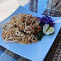 Pad Thai  · The classic stir fried rice noodles with egg, carrots, bean sprouts, green onion, ground pea...