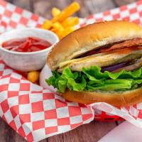 Classic Chicken Burger · 1/3 pound of ground meat, grilled chicken breast, Swiss, bacon, lettuce, tomato, pickles, re...
