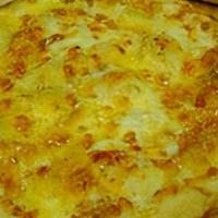 Cheesy Cheese Bread · Brushed with Garlic Infused Olive Oil, topped with. Mozzarella, Cheddar and Parmesan Romano ...