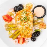 Arnies Seafood Louie · Grilled salmon, dungeness crab, bay shrimp, pickled asparagus, tomatoes, black olives and ha...
