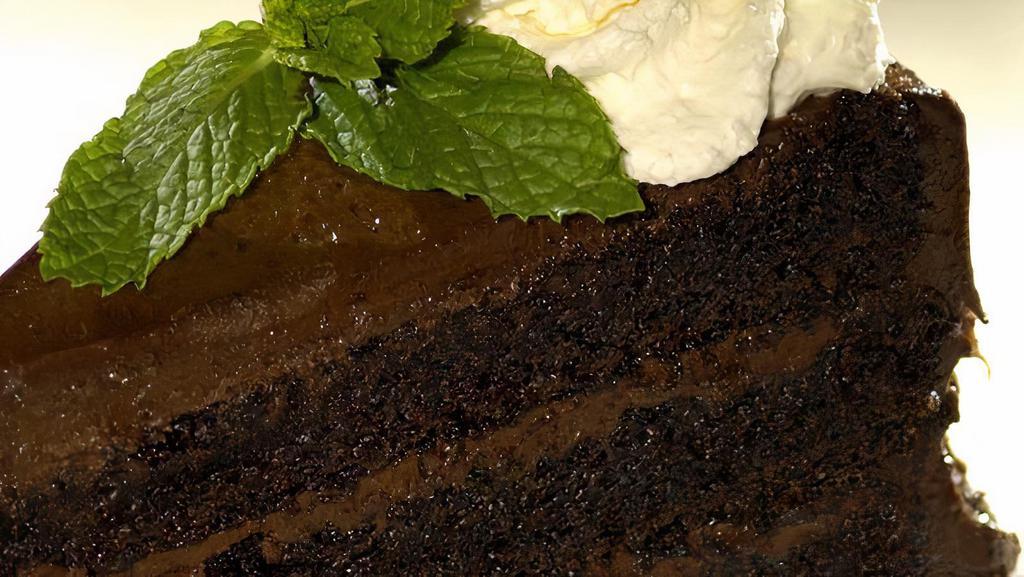 Chocolate Utopia · Six-layer chocolate cake, served warm with vanilla ice cream.