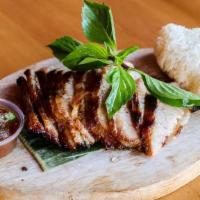 Grilled Pork Toro With Sticky Rice · Grilled pork collar; marinated with oyster sauce and soy sauce. Paired with sticky rice and ...