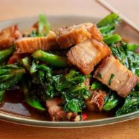 Stir Crispy Pork Belly With Chinese Broccoli · Crispy Pork belly stir fried with garlic, oyster sauce, and soy sauce (add fried egg $1.50) ...