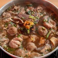 Hot Pot (Everything) · House beef soup with sliced of stewed beef, braised beef, beef meatballs, tripe, tongue, and...