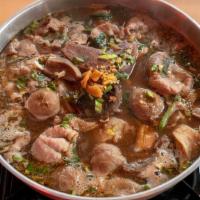 Hot Pot Beef · House beef soup with sliced of stewed beef, braised beef, beef meatballs. Based with steamed...