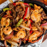 Rita’S Fajitas · Seasoned with onions, red and green pepper. Served with sour cream, guacamole, beans and pic...