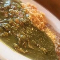Chile Verde · Chunky chopped beef smothered in green pepper sauce. Served with rice, beans and your choice...