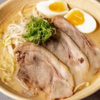 Tonkotsu Ramen · Classic Hakata-style ramen, silky tonkotsu (pork) broth served with wheat noodles, chashu (p...
