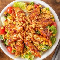 Bbq Chicken Salad · Romaine & Iceberg mix, smoky BBQ crispy chicken, grape tomato, roasted corn, black beans, sh...