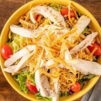 Southwest Chipotle Chicken Salad · Romaine & iceberg mix, grilled chicken, shredded jack cheddar cheese, black bean & roasted c...