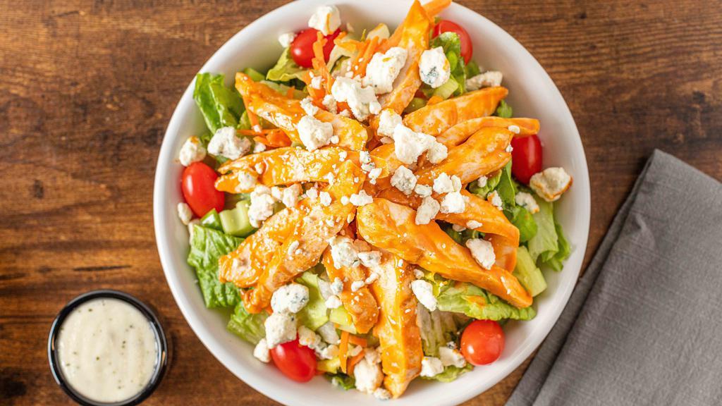 Buffalo Bleu Salad · Romaine & iceberg mix, grilled buffalo chicken, grape tomato, diced celery, matchstick carrots, blue cheese crumbles. Try it with bleu cheese dressing.