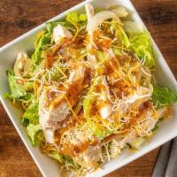 Fajita Chicken Salad · Romaine & iceberg mix, grilled chicken, sauteed peppers, onions and jalapeños, salsa roja, a...