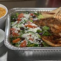 Roasted Chicken Family Meal · Roasted Chicken, Pita, Salad and Side of Rice and Tzatziki Sauce