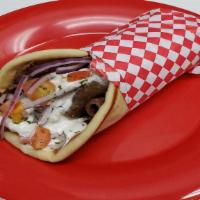 Gyro Sandwich · Gyro meat, tomatoes, onion and tzatziki sauce wrapped in a pita. Make a combo with fries and...