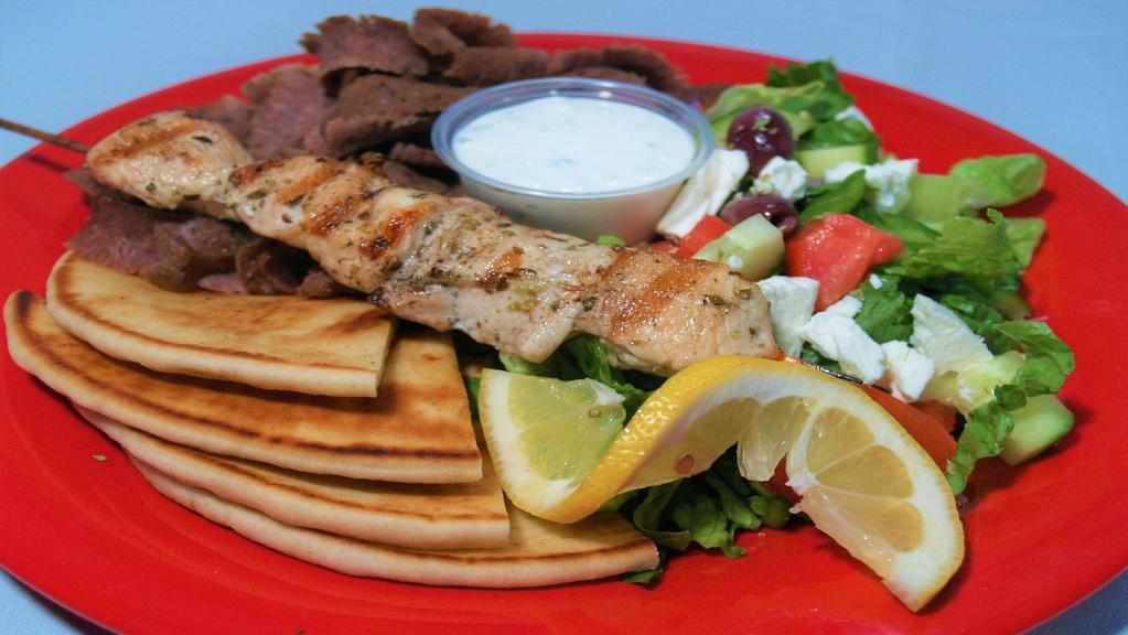 Gyro & Chicken Combo Plate · Gyro meat, chicken souvlaki, tzatziki sauce, pita, and Greek salad.
