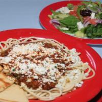 The Ultimate Greek Spaghetti Plate · Ground beef, sauce, Greek salad and pita bread.