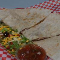 Chicken Quesadilla · Flour Tortilla, Served with Chicken, Cheese, Lettuce, with Salsa, and Sour Cream on the side.