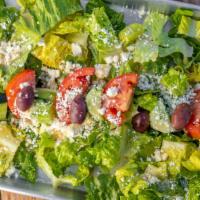 Greek Salad · Romaine lettuce, tomatoes, onions, cucumbers, feta, Kalamata olives and Greek dressing. Incl...