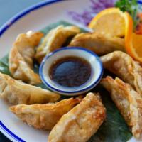 Chicken Pot Stickers · Chicken breast, mixed vegetables and ginger soy sauce.