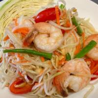 Papaya Salad · Traditional Thai Salad with shredded green papaya, carrot, tomato, green beans, garlic, mixe...