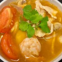 Tom Yum Soup · Spicy. Hot and sour soup, lemongrass, lime juice, kaffir lime leaf, onions, galling, mushroo...