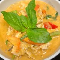 Red Curry · Spicy. Bell peppers, bamboo shoots, basil, red curry, and coconut milk.