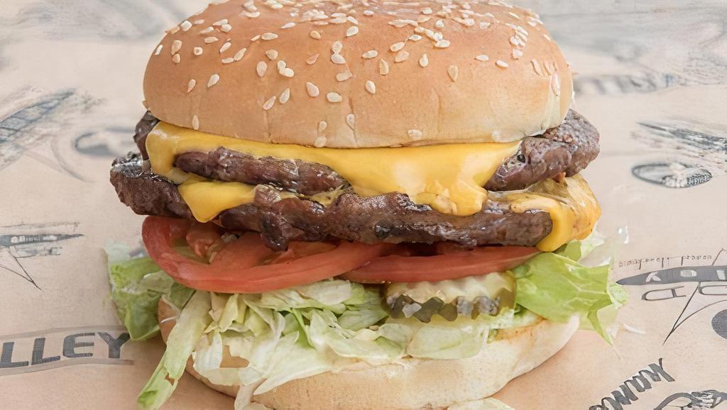 Double Cheeseburger · 2 Patties, American cheese, KV spread, lettuce, pickles, and tomatoes. Made with 100% Fresh ground beef patties.