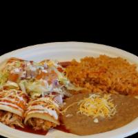 2 Enchiladas Plate · Two enchiladas topped with enchilada sauce, cheese, sour cream, lettuce, and pico de gallo. ...