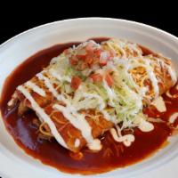 Side 2 Beef Enchiladas · Slow cooked shredded beef, enchilada sauce, cheese, sour cream, lettuce, pico de gallo.