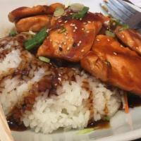 Teriyaki Salmon Bowl · Grilled Salmon with teriyaki sauce, comes with rice and steam veggies, eel sauce on top