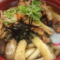 Tofu Veggie Udon Soup · Thick Udon Noodle soup with fish broth.