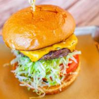 Craft Burger · American cheese, lettuce, tomato, caramelized onion, pickles and fry sauce. Add fries, salad...