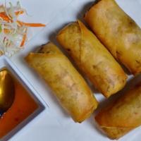 Spring Rolls · Deep-fried spring roll stuffed w/carrots, shitake, bean thread noodle and cabbage.