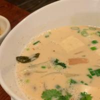 Tom Kha · The popular Thai coconut milk soup simmered with lemongrass, galangal, kaffir lime leaves, m...