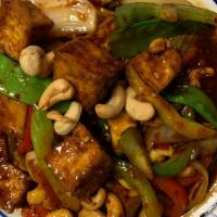 Cashew Nut Lovers · Sautéed meat or vegetarian tofu in our own smoked chili sauce, zucchini, celery, onion, bell...
