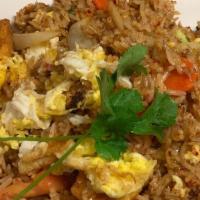 Thai Fried Rice · A popular dish, stir-fried jasmine rice with eggs, onions, carrot, broccoli, tomatoes and ci...