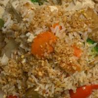 Garlic Fried Rice · Roasted garlic stir-fried with jasmine rice, egg, broccoli, onions, carrots, bell peppers an...