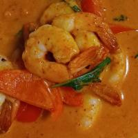 Red Curry · Red curry in coconut milk, bamboo shoots, green beans, zucchini, bell peppers, Thai sweet ba...