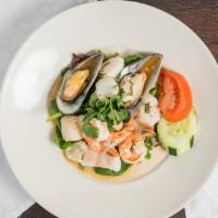 Yum Seafood · (Gluten-Free) Wild scallop, green shell mussel, fish, and prawn steamed then tossed in yum d...