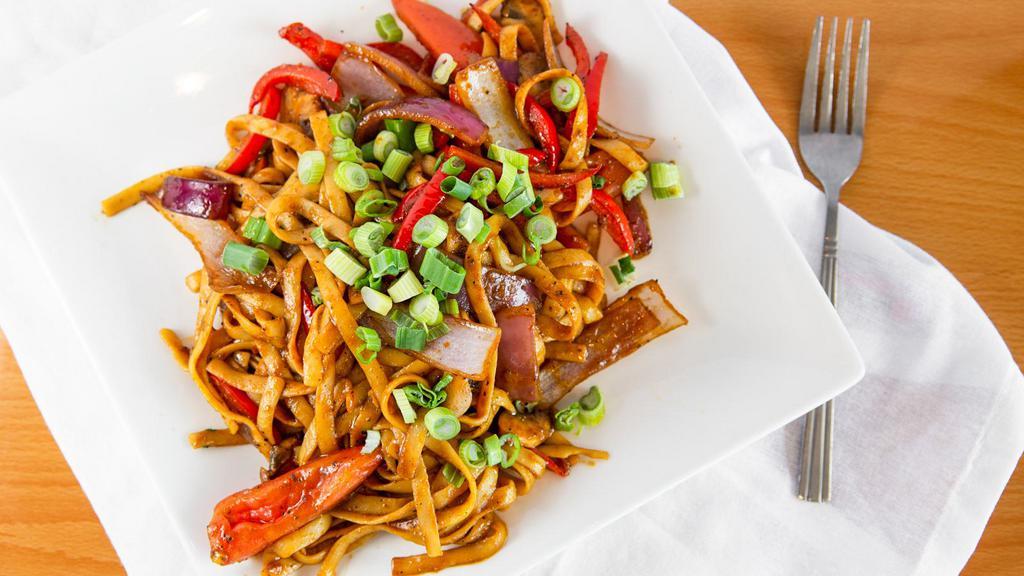 Tallarin Saltados · Stir-fry vegetables with noodles with choice of beef, chicken or seafood.