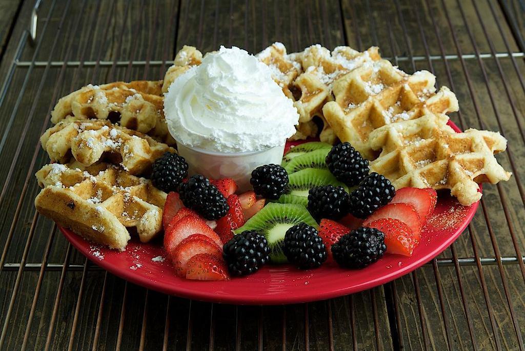 Waffle Dipper Platter · 8 mini waffles, dusted with freebies (cinnamon sugar, powdered sugar, and whipped cream) and your choice of 3 toppings on the side