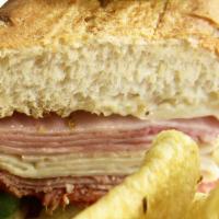 Italian Hoagie · Layered with ham, turkey, peppered salami and sliced pepperoni. Topped with sliced green pep...