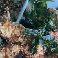 Larb Gai · Ground chicken, onion, cilantro and lime.