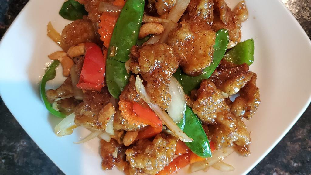 Honey Cashew Chicken · Crispy Chicken, veggies & honey glaze