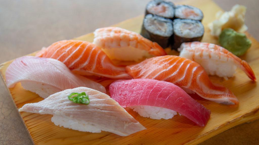 Sushi Nigiri (Assorted Sushi Plate) Dinner · 1 Tuna, 1 Yellow Tail, 2 Prawn, 1 Albacore, 2 Salmon and 4 Pieces of Assorted Rolls.