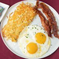 Nice And Easy Classic Breakfast · Two eggs, meat, potato, toast, or grits.