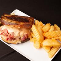 Pastrami Swirl Reuben · Grilled pastrami, Swiss cheese, sauerkraut, and grilled marble rye Thousand Islands. Served ...