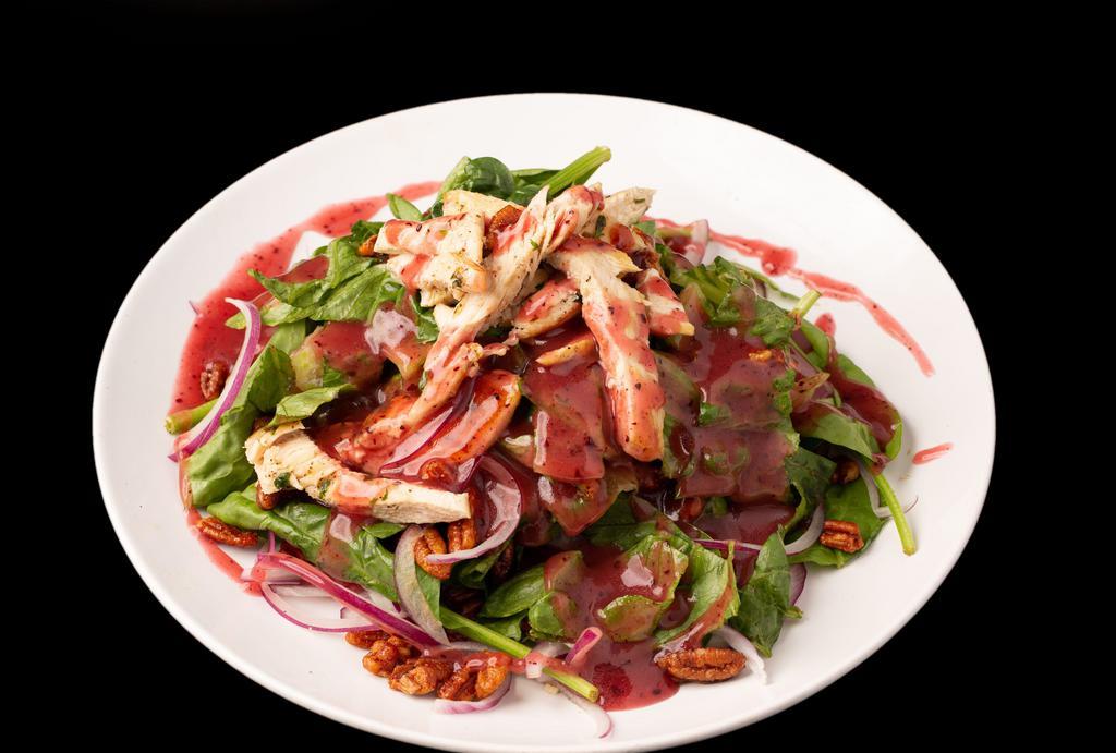 Chicken Raz Salad · Grilled chicken, romaine, spinach, tomatoes, candied pecans, crispy onions, and raspberry vinaigrette. Served with garlic bread dressing choice ranch, Italian, Thousand islands, honey mustard, raspberry vinaigrette, buffalo, and oil vinegar.